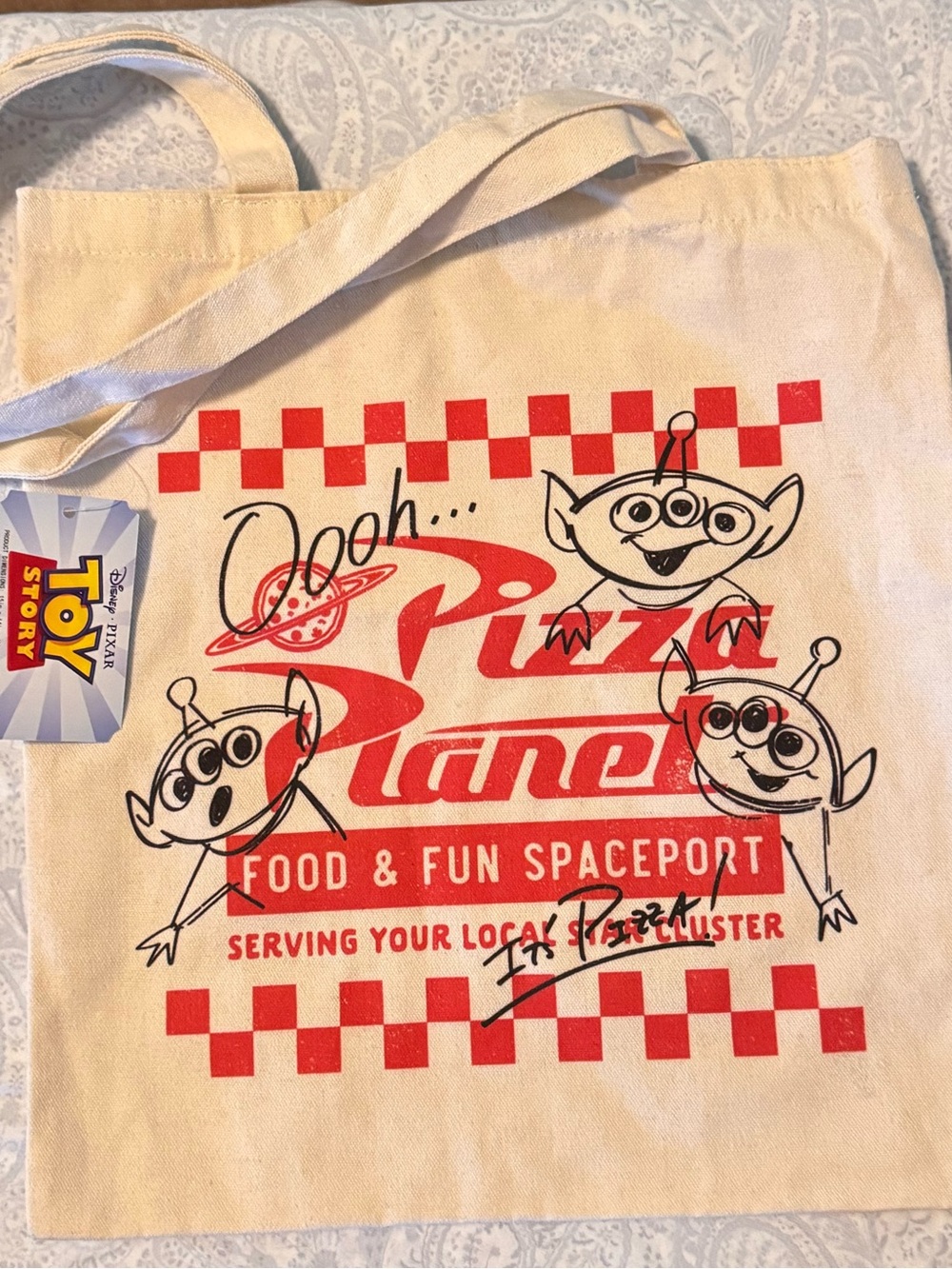 Disney Pixar Pizza Planet Canvas Tote Bag - Cream with Red Print